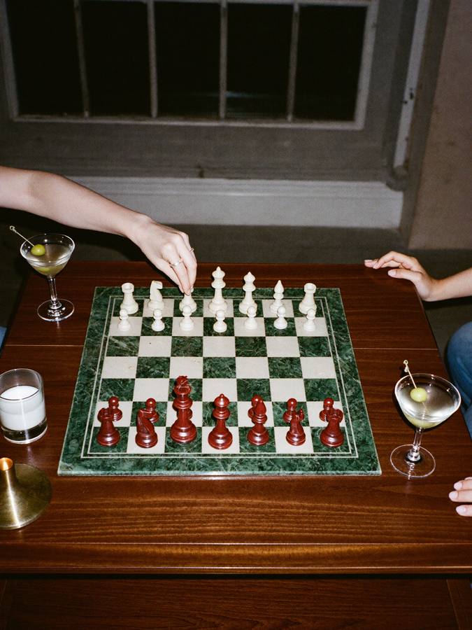 A chessboard mid-game seen from above